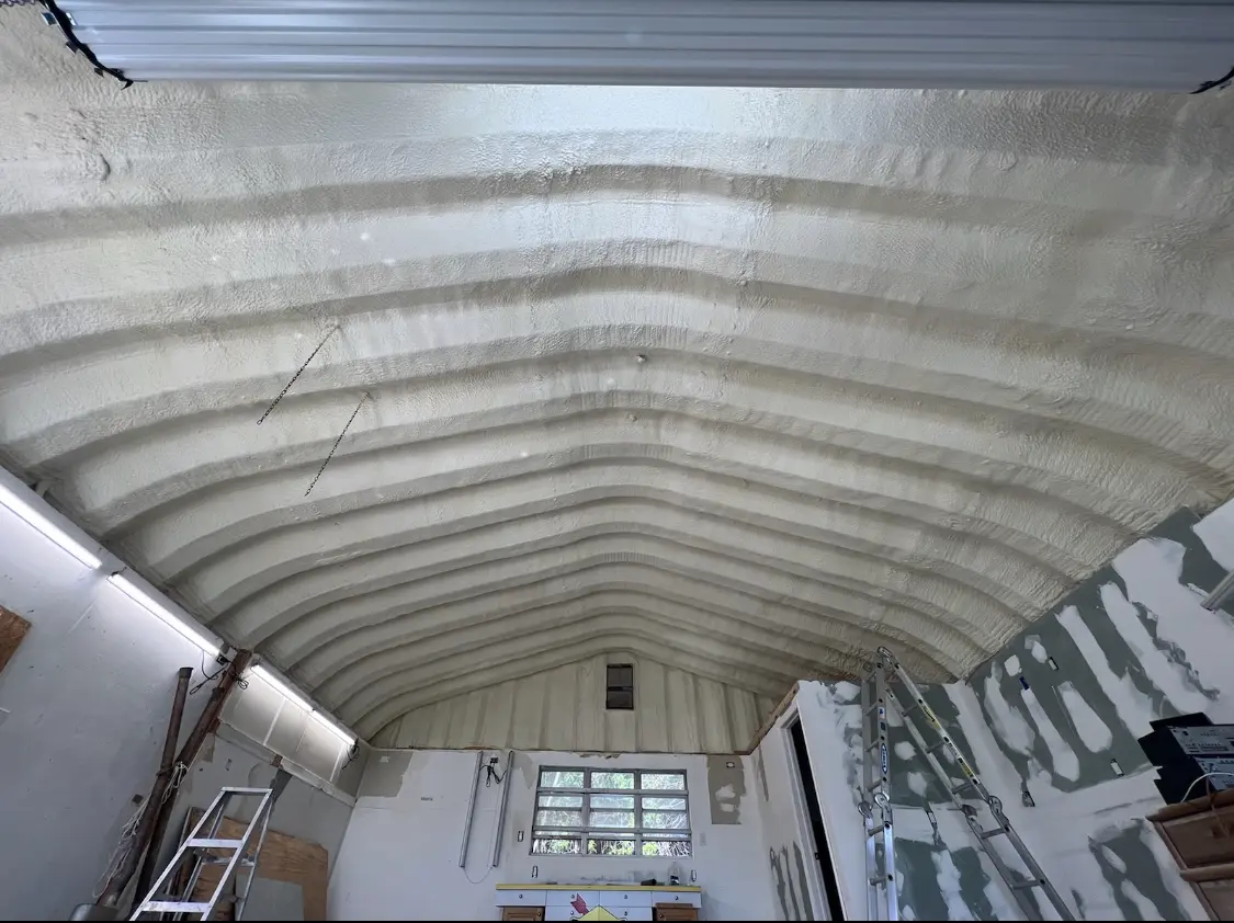 Spray polyurethane foam applied to the underside of a metal roof deck in Rochester Hills